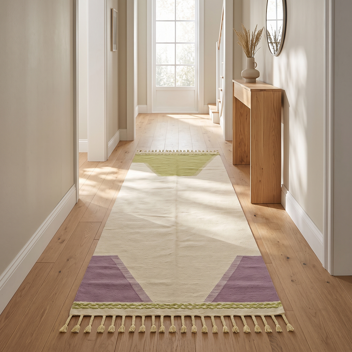 Handmade Moroccan kilim runner rug with green and purple geometric design on white background, flatwoven minimalist Moroccan corridor rug