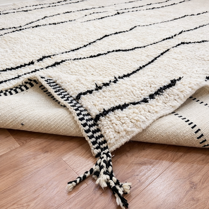 handmade berber wool rug with organic black lines