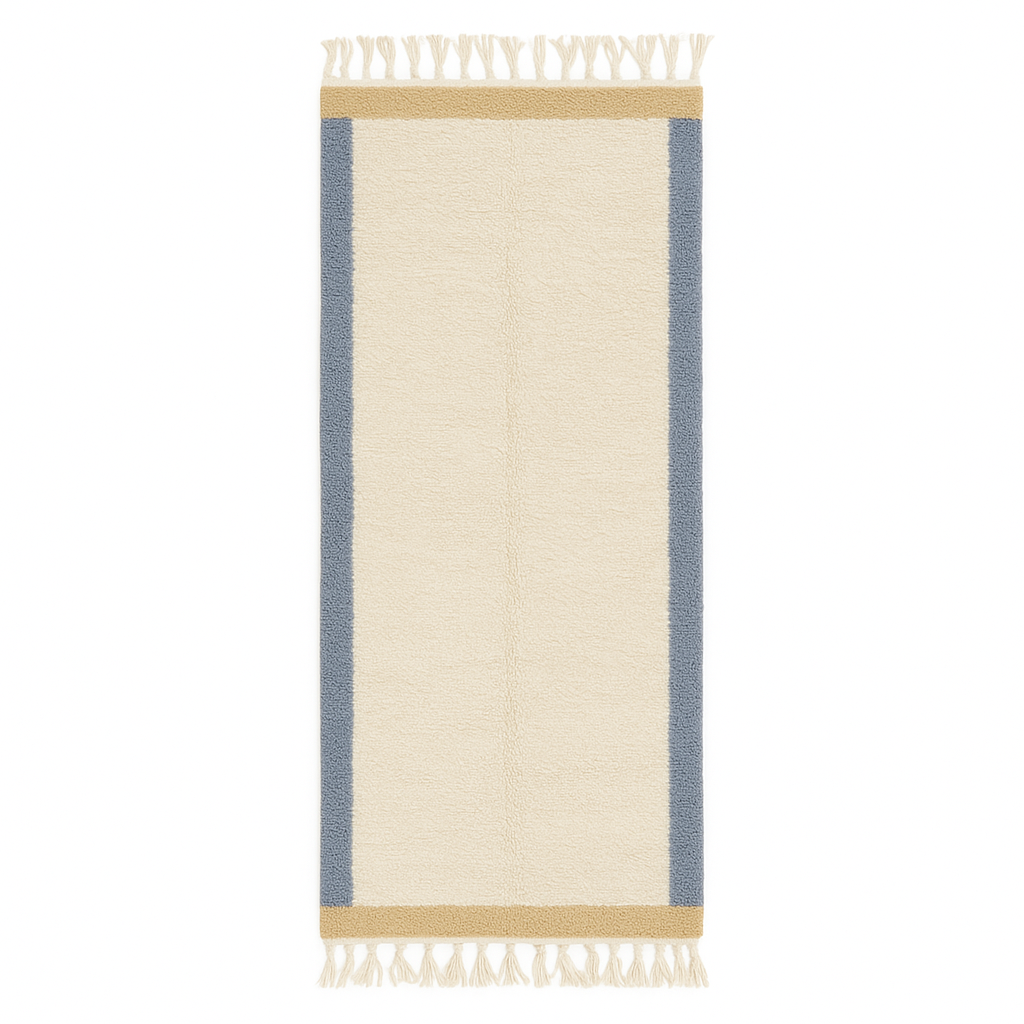 Handmade Moroccan runner rug with white wool center, blue borders, and beige accents, crafted by Berber artisans.