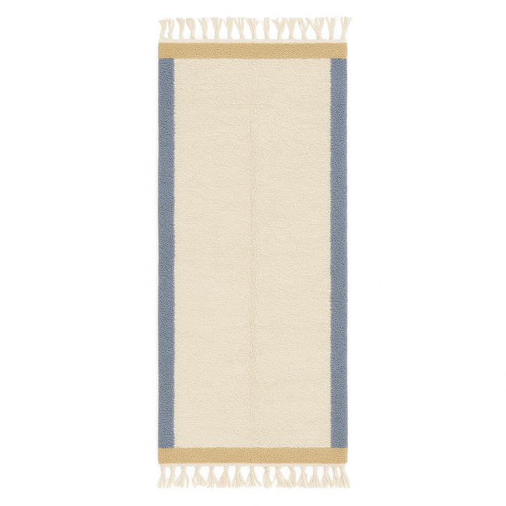 Handmade Moroccan runner rug with white wool center, blue borders, and beige accents, crafted by Berber artisans.