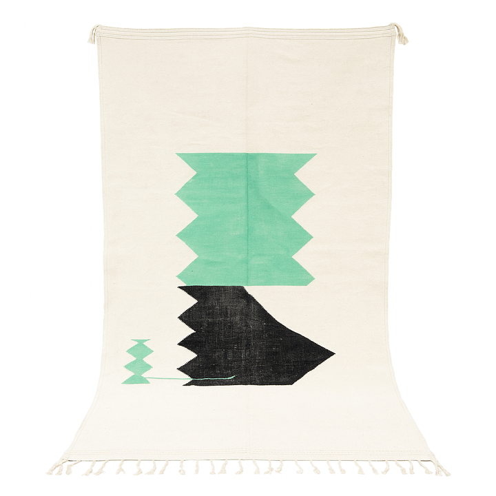 Handwoven Moroccan flatweave wool rug with mint green and black geometric design on ivory background