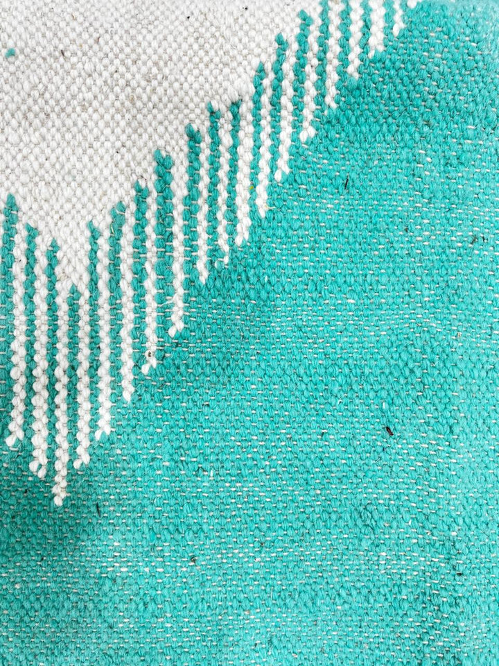 Handwoven Moroccan flatweave wool rug in mint green, rose, and beige – geometric kilim Berber carpet