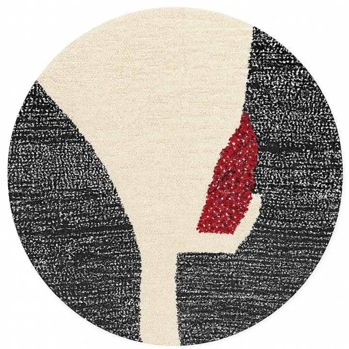 Round modern Moroccan rug with abstract black, white, and red textured pattern.