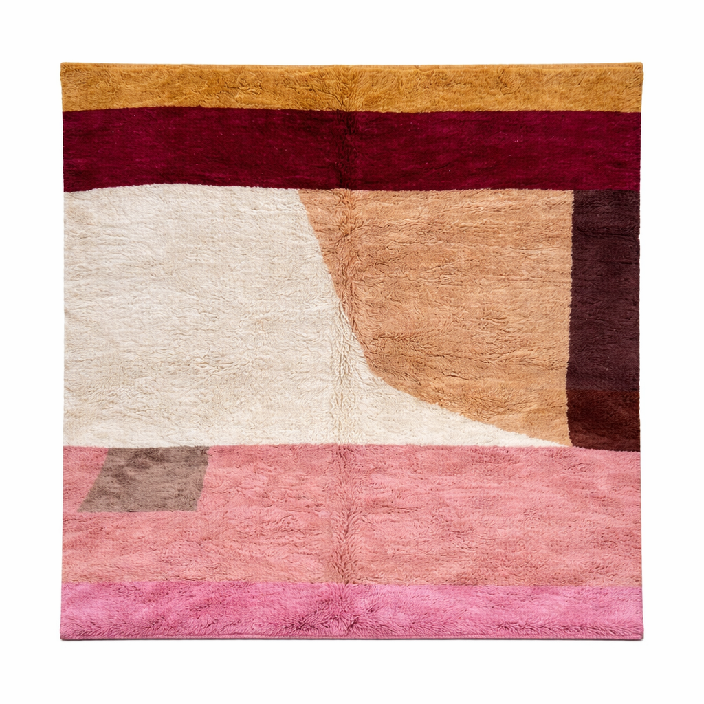Handmade Moroccan wool rug with pink, cream and terracotta color-block design. Plush, soft texture crafted by artisans.