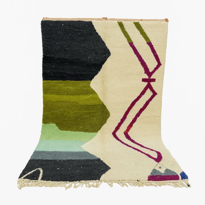 Handwoven Moroccan wool rug with abstract modern design in green, black, and magenta