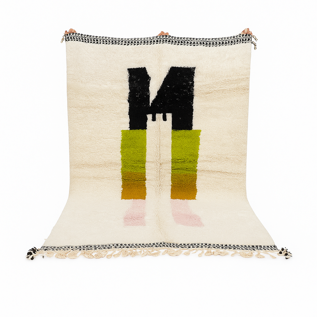 Modern abstract Moroccan wool rug with geometric blocks in black, green, and ochre, handmade by Berber artisans