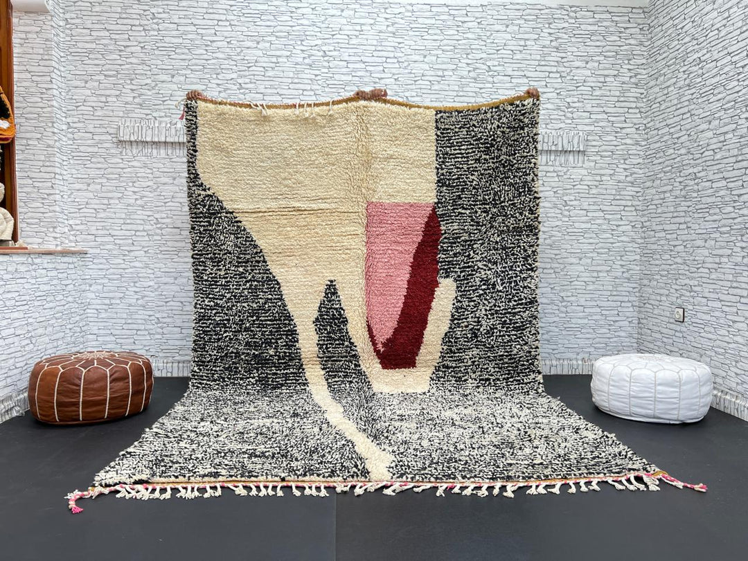 Handwoven Moroccan wool rug with abstract modern pattern in ivory, black, and red tones