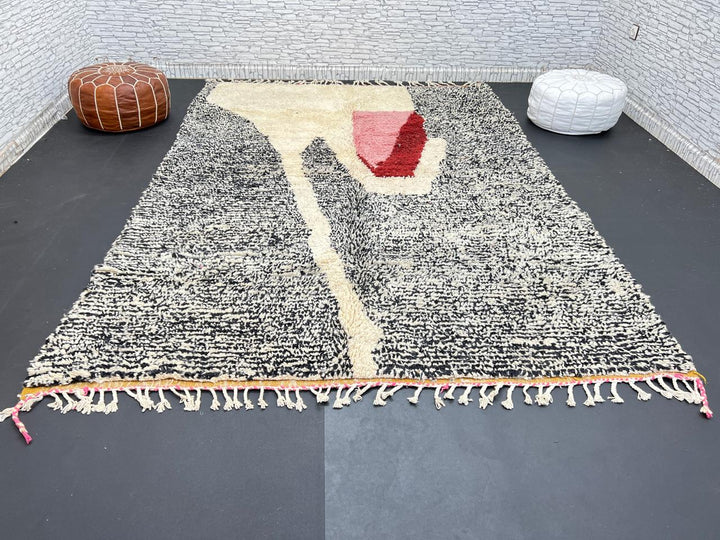 Handwoven Moroccan wool rug with abstract modern pattern in ivory, black, and red tones