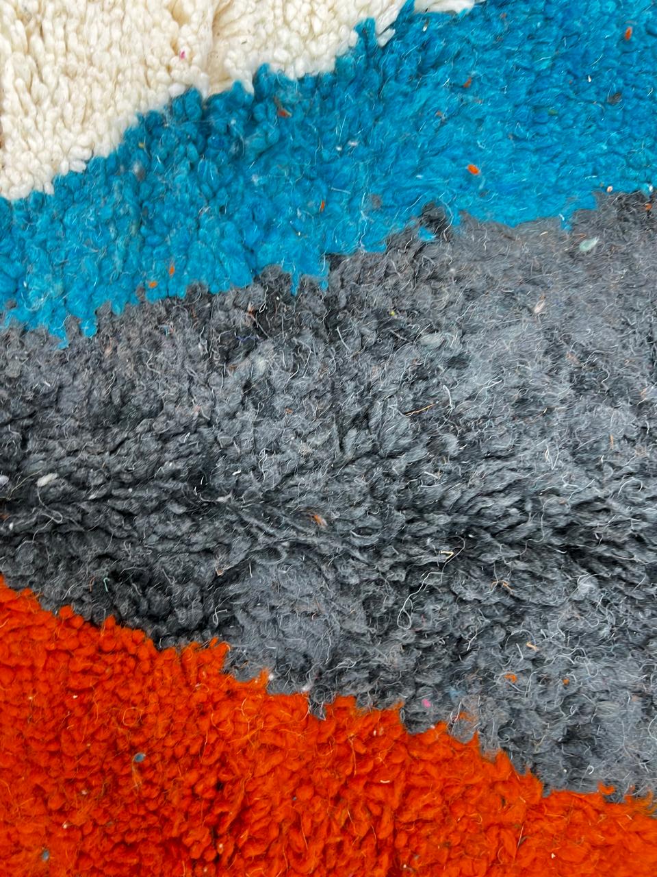Handmade Moroccan runner rug with abstract color block design in black, teal blue and burnt orange on a white wool background, modern Berber style carpet runner for hallway or entryway