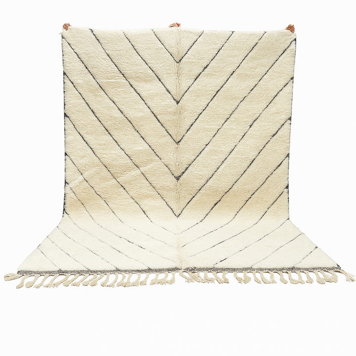 Modern Moroccan Beni Ourain wool rug with black chevron lines on cream background, handmade by Berber artisans
