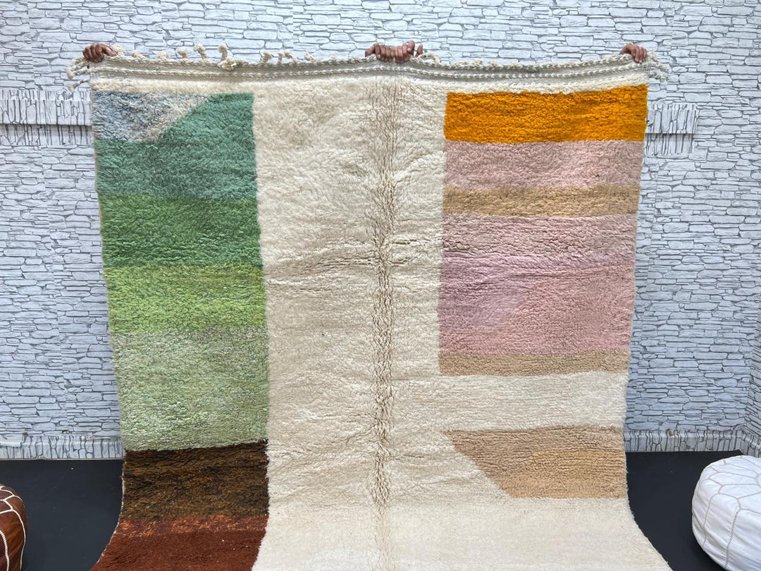 Modern color block Moroccan wool rug with green, pink, brown, and white geometric pattern