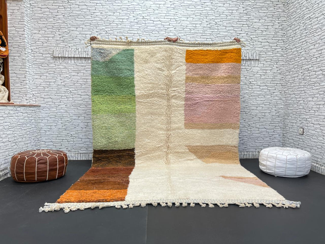 Modern color block Moroccan wool rug with green, pink, brown, and white geometric pattern