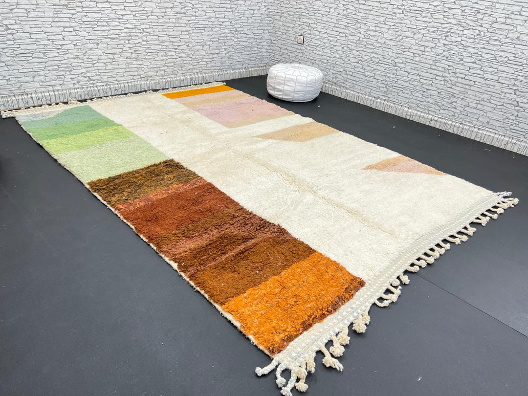 Modern color block Moroccan wool rug with green, pink, brown, and white geometric pattern