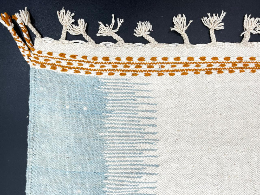 Flatweave Moroccan wool rug in beige, blue, and terracotta color blocks, handmade by Berber artisans