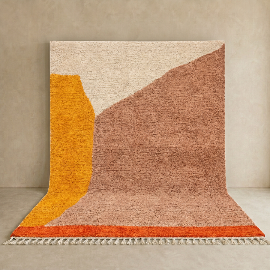 Handmade Moroccan wool rug with minimalist earth-tone design. Soft plush texture, modern style, and ethically crafted in Morocco.