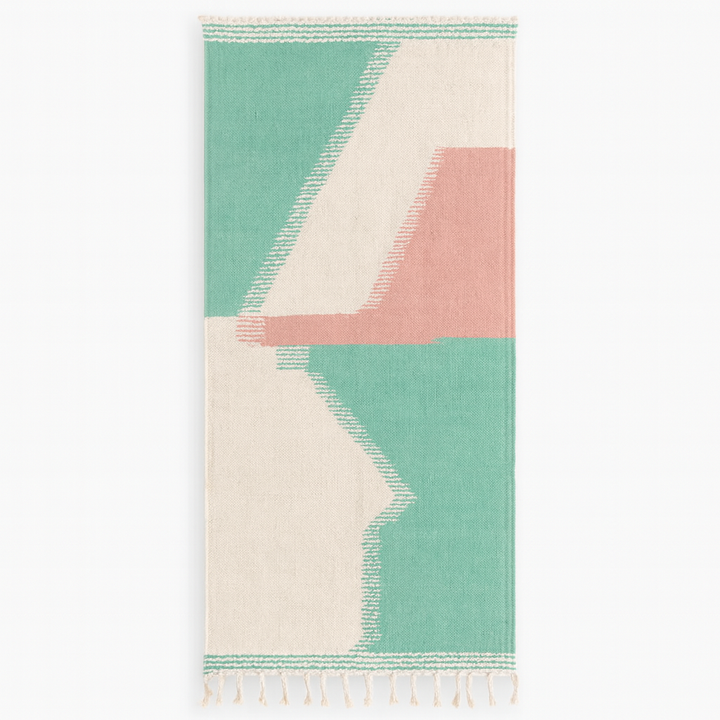 Handmade Moroccan Kilim runner rug with pastel green, blush pink, and white geometric design in flatweave texture.