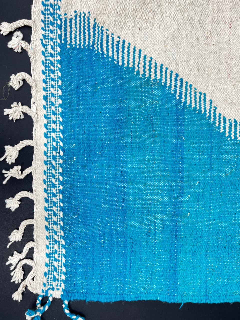 Handmade Moroccan kilim runner rug with purple and blue geometric design on white background, flatwoven hallway runner
