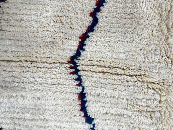 Modern Moroccan runner rug with abstract Berber design in blue, green, red and white, handmade wool hallway carpet with tribal motifs