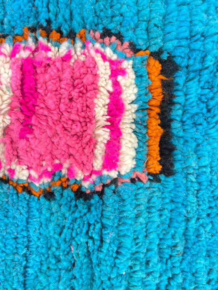 Pink and blue Moroccan wool rug with vertical stripe and abstract Berber motifs