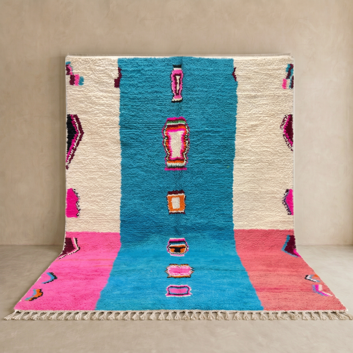 Pink and blue Moroccan wool rug with vertical stripe and abstract Berber motifs
