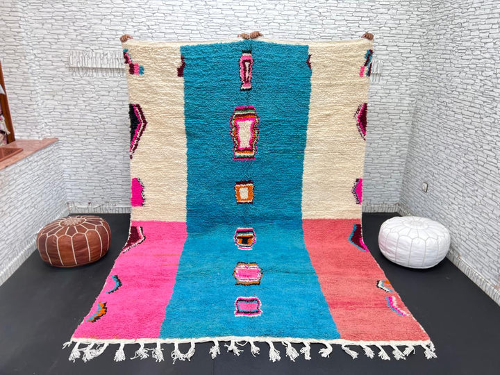Pink and blue Moroccan wool rug with vertical stripe and abstract Berber motifs