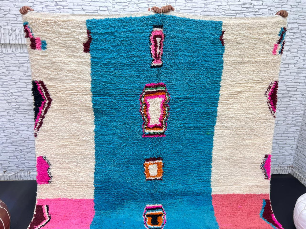 Pink and blue Moroccan wool rug with vertical stripe and abstract Berber motifs