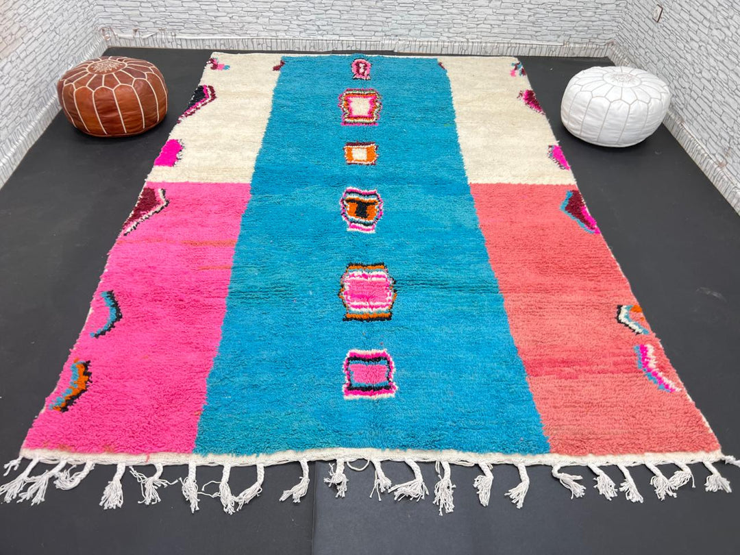 Pink and blue Moroccan wool rug with vertical stripe and abstract Berber motifs