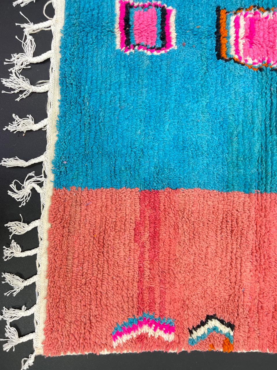 Pink and blue Moroccan wool rug with vertical stripe and abstract Berber motifs