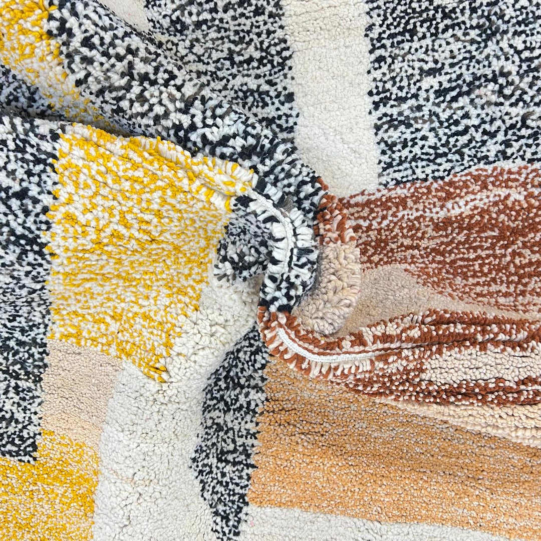 Modern Moroccan wool runner rug with abstract geometric design in mustard yellow, terracotta, beige and black, handmade Berber carpet