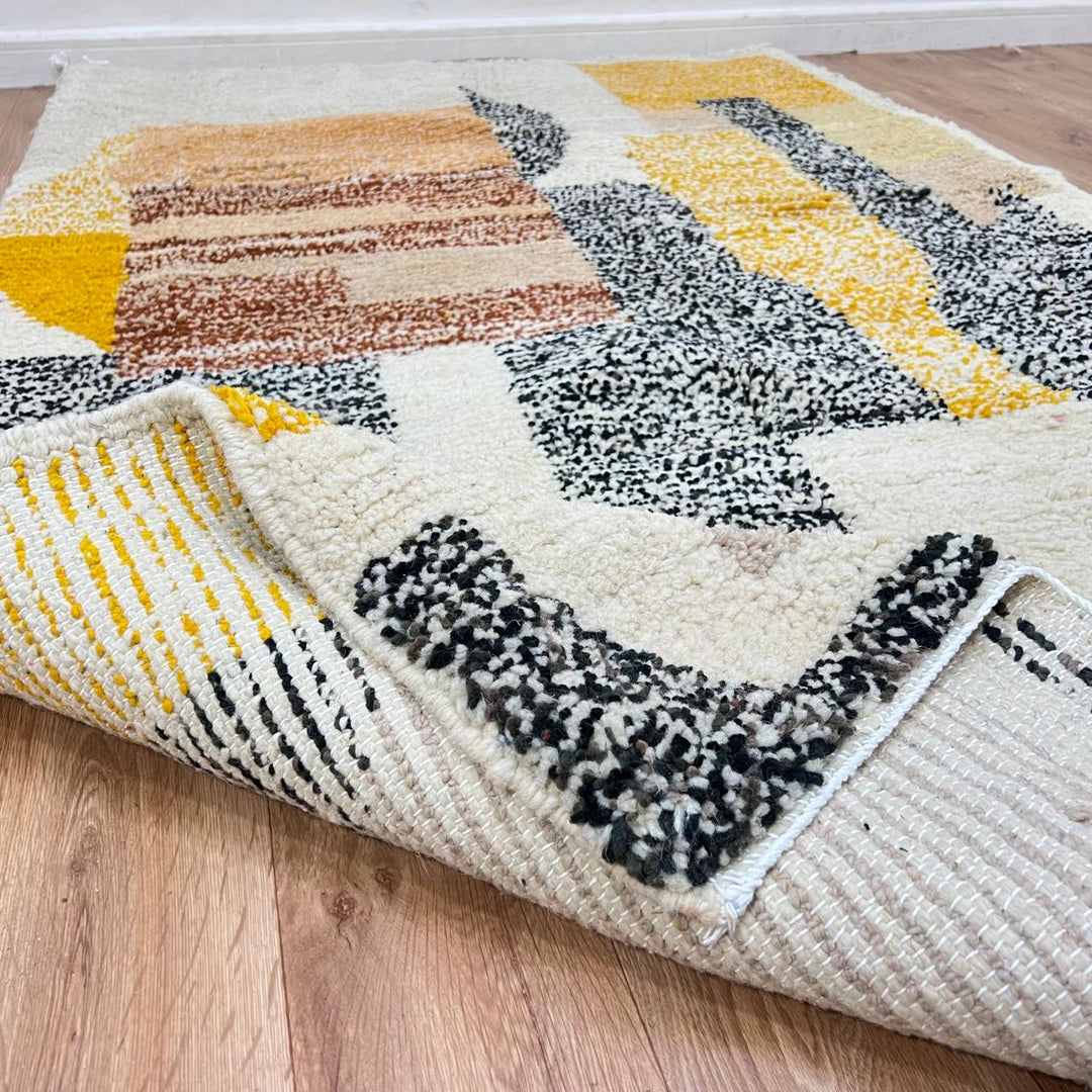 Modern Moroccan wool runner rug with abstract geometric design in mustard yellow, terracotta, beige and black, handmade Berber carpet