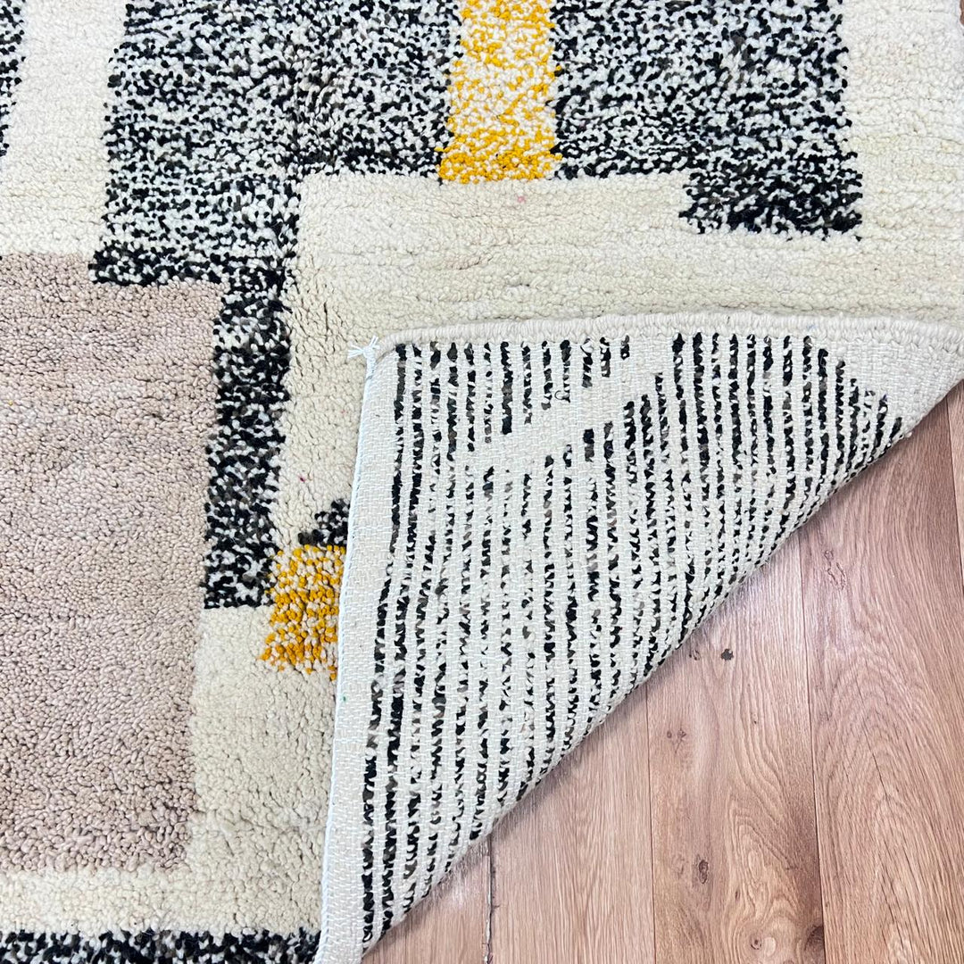 Modern Moroccan wool runner rug with abstract geometric design in mustard yellow, terracotta, beige and black, handmade Berber carpet
