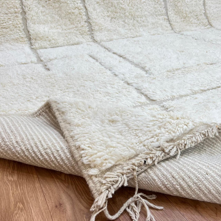Modern Moroccan wool runner rug with geometric Berber pattern in ivory