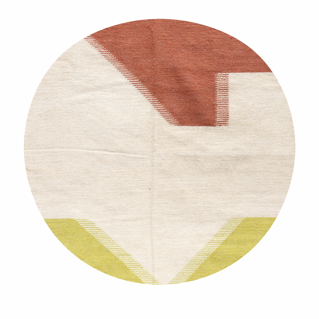 Flat-weave round Moroccan wool rug with ivory base and terracotta and yellow abstract design