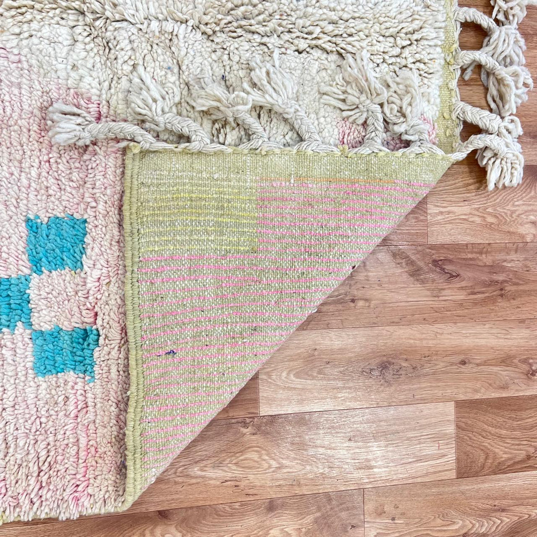 Vintage Moroccan wool rug with colorful geometric Berber patchwork in orange, blue, mint green, lavender and ivory, handmade in Morocco.