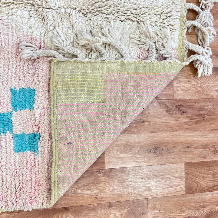 Vintage Moroccan wool rug with colorful geometric Berber patchwork in orange, blue, mint green, lavender and ivory, handmade in Morocco.