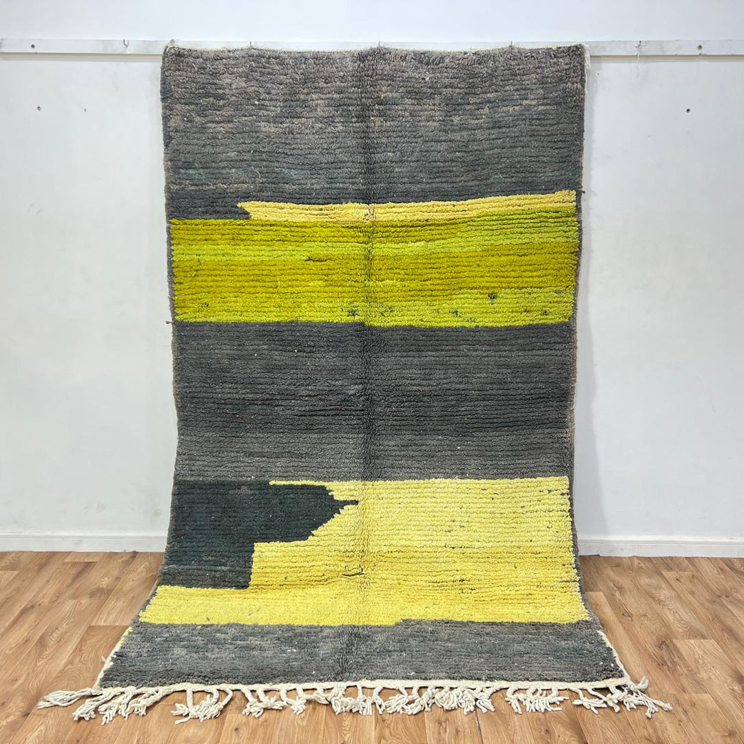 Modern vintage Moroccan wool rug in grey and yellow with geometric design, handwoven from natural wool in Morocco.