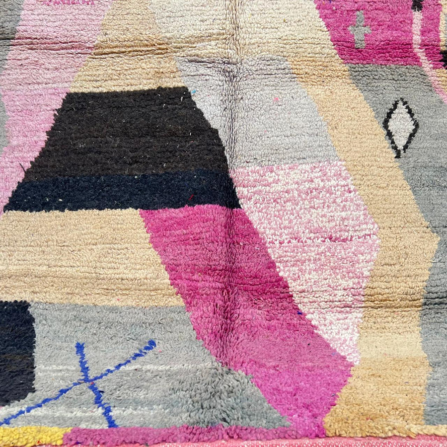 Vintage Moroccan wool rug with abstract geometric Berber design in blush pink, charcoal black, sage green and beige, handmade in Morocco.