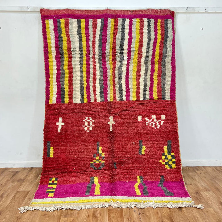 Vintage Moroccan striped wool rug with red pink yellow and gray Berber pattern, handmade in Morocco