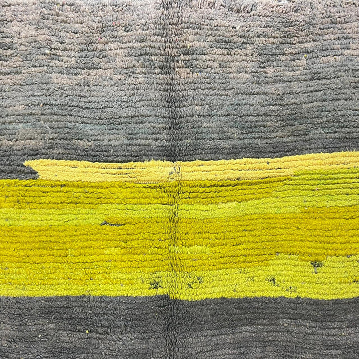 Modern vintage Moroccan wool rug in grey and yellow with geometric design, handwoven from natural wool in Morocco.