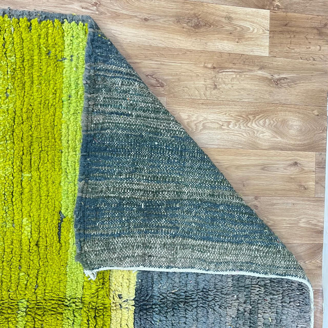 Modern vintage Moroccan wool rug in grey and yellow with geometric design, handwoven from natural wool in Morocco.