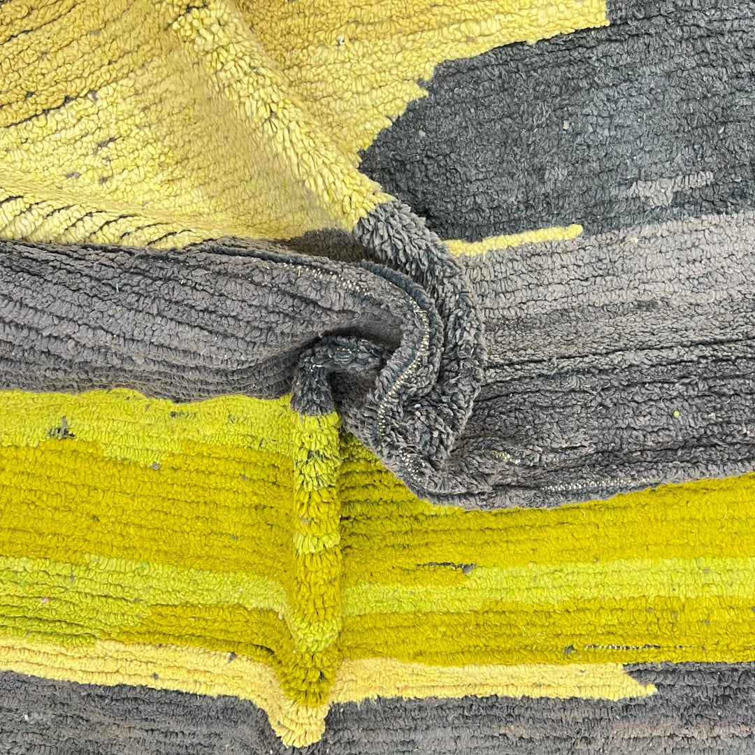 Modern vintage Moroccan wool rug in grey and yellow with geometric design, handwoven from natural wool in Morocco.