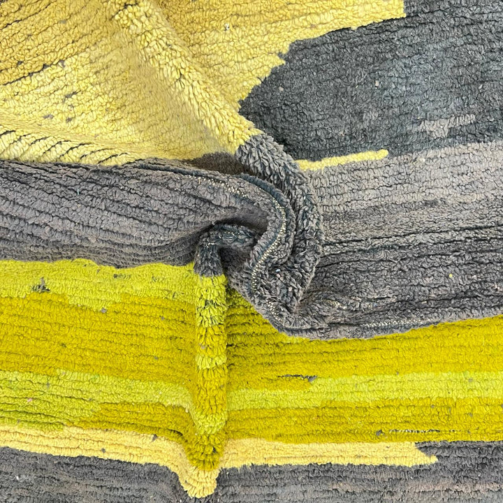 Modern vintage Moroccan wool rug in grey and yellow with geometric design, handwoven from natural wool in Morocco.