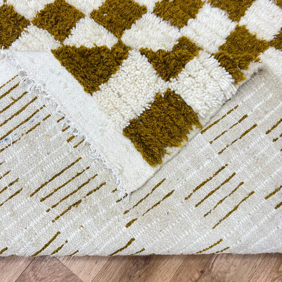 Green Moroccan rug 8x10 in olive and cream checkerboard pattern
