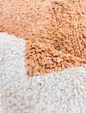 Handmade abstract Moroccan runner rug in white wool with ochre, sand beige and gray organic shapes.