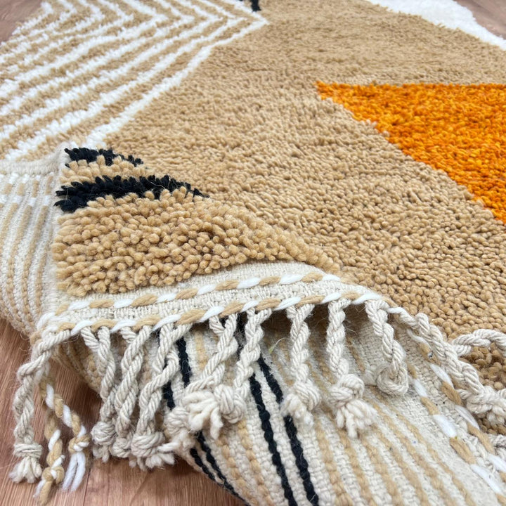 Handmade Moroccan wool rug with modern earth-tone geometric design. Soft plush texture, minimalist style, and artisan crafted.