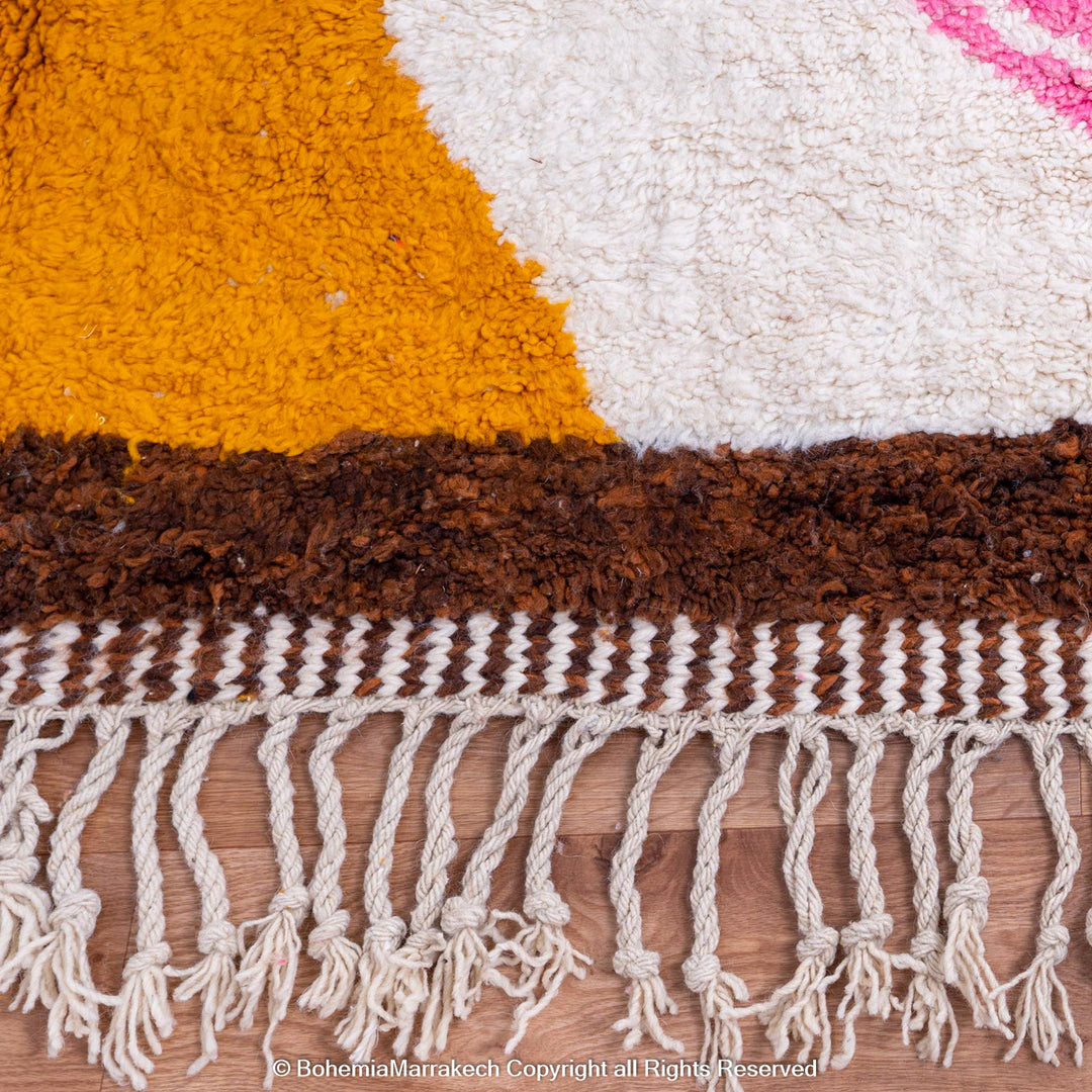 Colorful Moroccan Beni Ourain shag rug with diamond motifs, handmade from wool