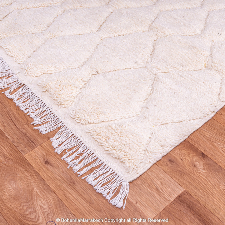White handmade Moroccan wool rug with subtle geometric Beni Ourain diamond pattern