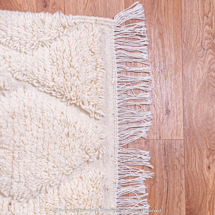 White handmade Moroccan wool rug with subtle geometric Beni Ourain diamond pattern