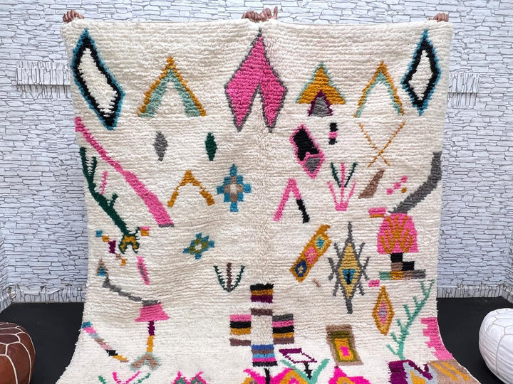 Natural white Moroccan Berber wool rug with colorful symbolic patterns