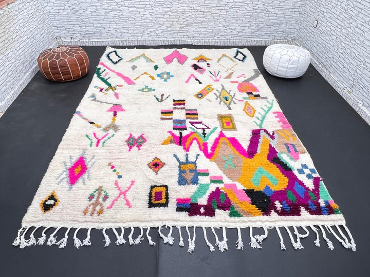 Natural white Moroccan Berber wool rug with colorful symbolic patterns